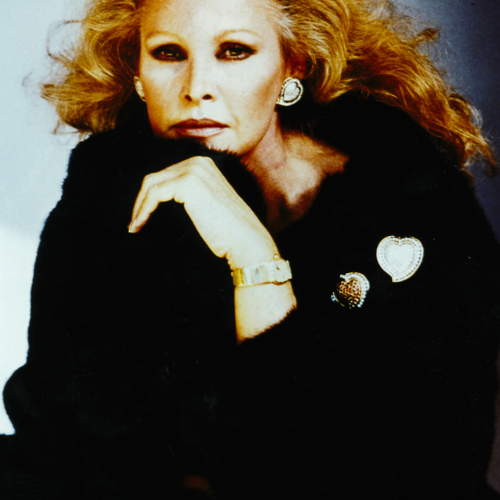 Actress Ursula Andress wearing a heart set brooches & earrings for a Repossi advertising campaign, 1980